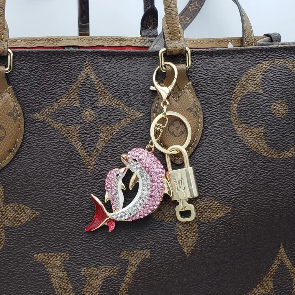 Authentic Louis Vuitton Gold Lock 🔒 Unbranded Dolphine Keychain Bag Charm LV